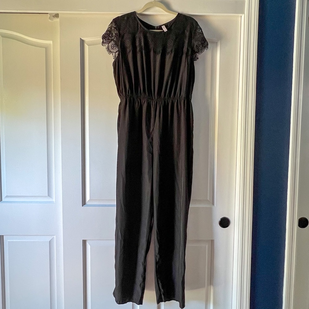 All black polyester and lace jumpsuit with zipper enclosure. Size XL xhilaration